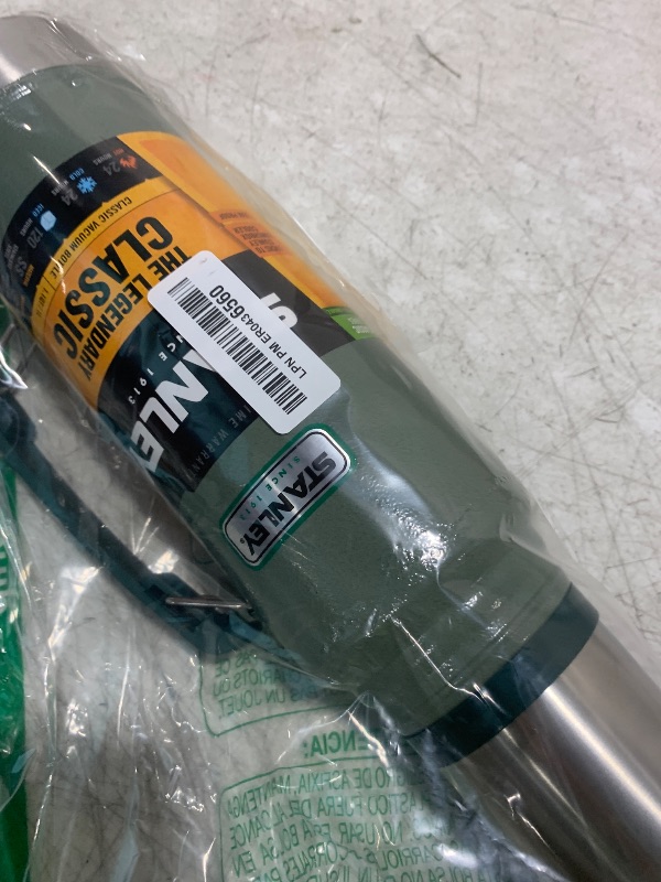 Photo 1 of Stanley Heritage Classic Vacuum Bottle with Handle 1.1 qt | Wide Mouth with Leakproof Cup Lid | Keep Drinks Hot or Cold for Travel | Insulated Stainless Steel Thermos | BPA-Free | Hammertone Green