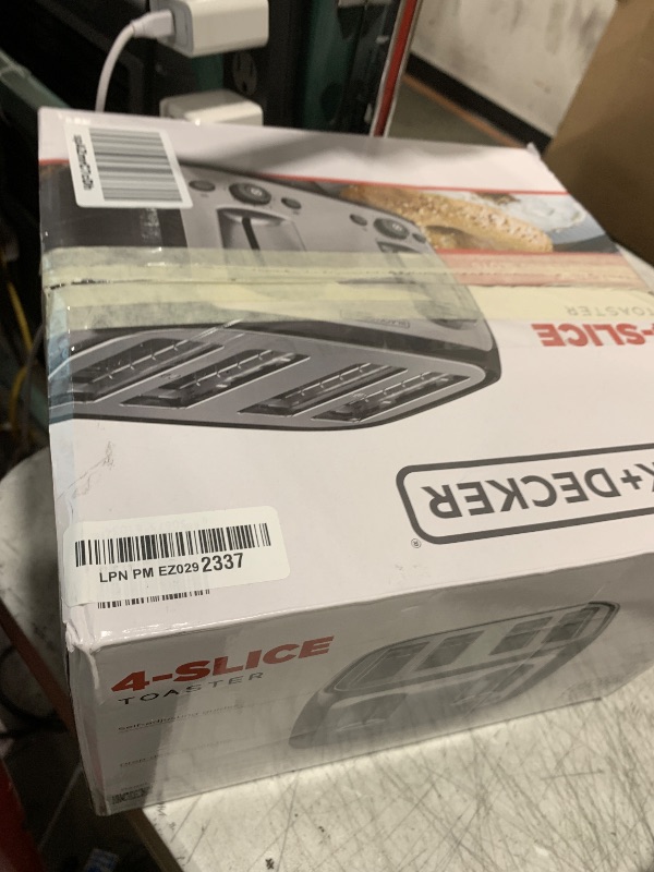 Photo 1 of BLACK+DECKER 4-Slice Toaster, Extra Wide Slots, 7 Shade Settings, 1400 Watts, Frozen and Bagel Buttons, Toast Shade Selector, Extra Lift