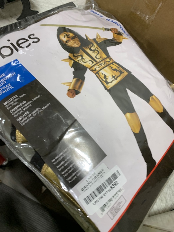 Photo 1 of Rubies Child's Gold Ninja Costume, Large for Themed Parties and Halloween