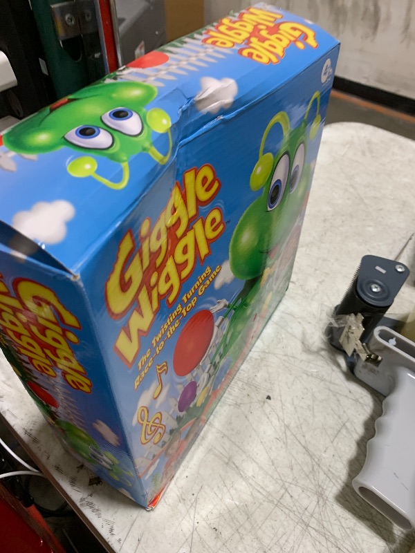 Photo 1 of PlayMonster Giggle Wiggle Board Games for Kids, Hand-Eye Coordination, Preschool Games, The Twisting-Turning Race to Get Your Marbles to The Top Game, Ages 4+, Batteries Not Included