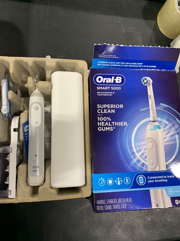 Photo 1 of Oral-B Smart 5000 Rechargeable Electric Powered Toothbrush, Black with Travel Case and Bluetooth - Visible Pressure Sensor to Protect Gums - 5 Cleaning Modes - 2 Minute Timer