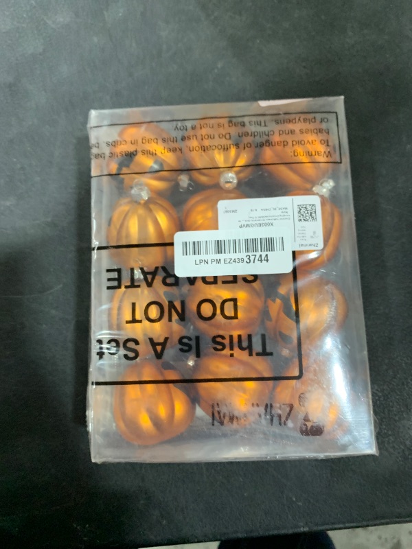 Photo 1 of Zhanmai Pumpkin Hanging Ornaments Spooky Halloween Tree Decorations Mini Pumpkin Ball Jack O Lantern Tree Decorations for Scary Party Supplies(12 Pcs,Gold)