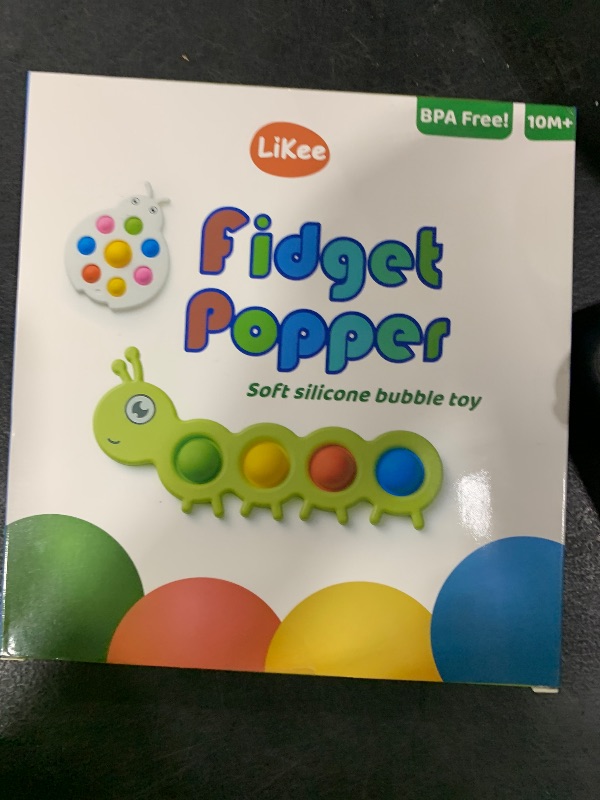 Photo 1 of LiKee Fidget Popper Sensory Baby Toys for 10+ Months, Push and Popping Busy Board, Montessori Toys for 1+ Years Old, Airplane Car Travel Toy for Toddlers 1-3 Stress Relief (2 Pieces)
