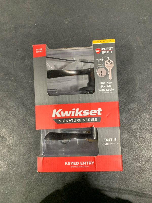 Photo 1 of Kwikset Tustin Entry Door Handle with Lock and Key, Secure Keyed Reversible Lever Exterior, For Front Entrance and Bedrooms, Venetian Bronze, Pick Resistant Smartkey Rekey Security and Microban