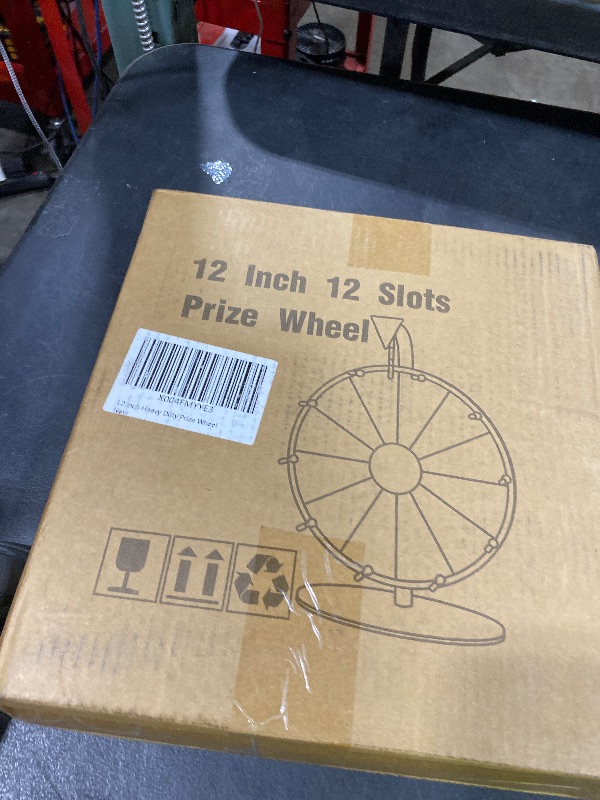 Photo 1 of ORWOD Prize Wheel, 12 Inch Heavy Duty Spinning Wheel for Prizes, 12 Slots Color Spinning Prize Wheel, Spin Wheel for prizes with Dry Erase Markers & Eraser for Show, Carnival, Fortune Spinning Game
