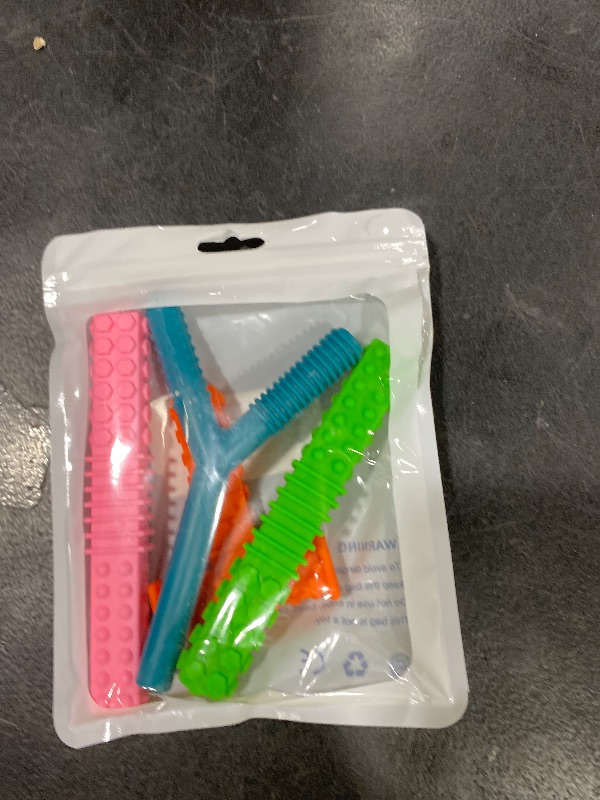 Photo 1 of Sensory Chew Toys for Autistic Children, 4 Pack Silicone Chew Tube Teething Sticks Toys for Autism, ADHD, SPD, Chewies with Special Needs, Oral Motor Chewy Tool for Sensory Kids Chewer.