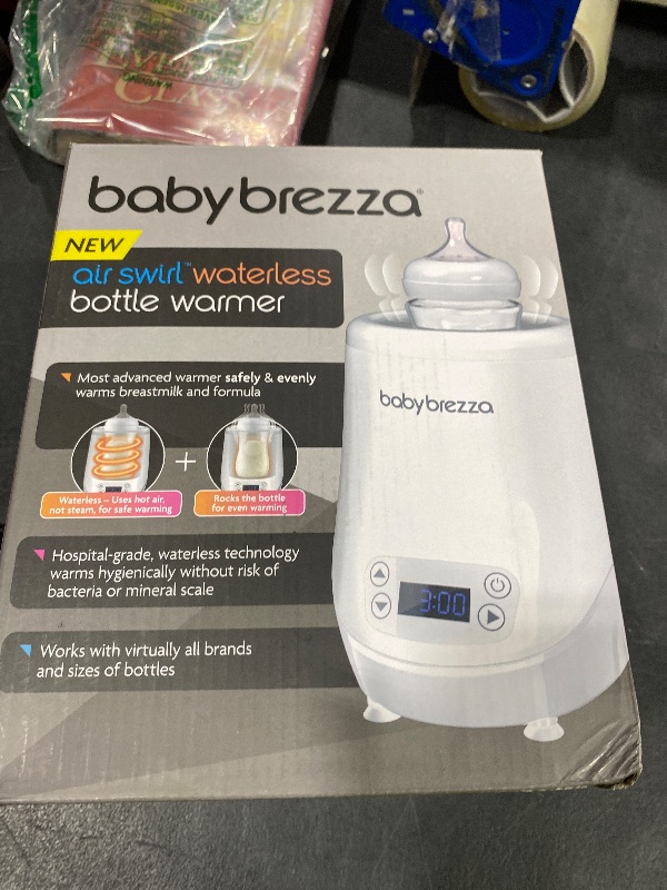 Photo 1 of Baby Brezza AirSwirl Waterless Baby Bottle Warmer - Safely Warm Breastmilk + Formula - Bottles Stay Dry + Nutrients are Protected - Works with Nearly All Bottles