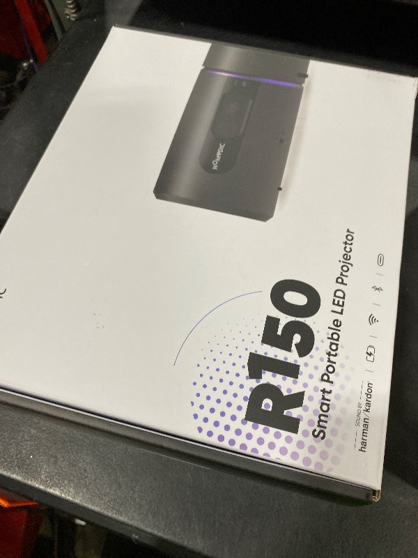 Photo 1 of NOMVDIC R150 Mini Projector, Portable Battery Operated Projector with 4hrs of Playtime , Ceiling Projector with 90? Rotating Lens, 6W Harman Kardon Speaker, Auto Keystone