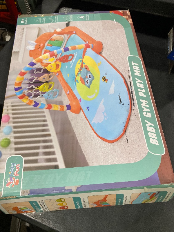 Photo 1 of HOLYFUN Baby Gym Play Mat, Play Piano Tummy Time Mat with Activity Gym, 5 Infant Learning Sensory Baby Toys, Musical Activity Center for Early Development and Entertainment, Pink