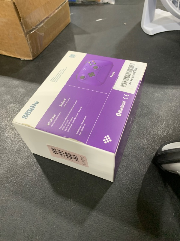 Photo 1 of 8BitDo Ultimate 2 Wireless Controller with TMR Joysticks for Windows & Android, Gaming Controller with Switchable Hall Effect/Tactile Triggers, RGB Fire Ring, 8Speed Wireless Tech, Charging Dock, Purple