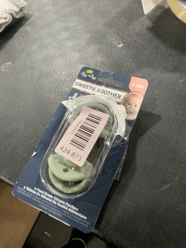 Photo 1 of Itzy Ritzy Silicone Pacifiers for Ages 6-18 Months - Itzy Soother Pacifiers Feature Collapsible Handle & Two Air Holes for Added Safety; Set of 2 in Agave & Succulent, Ages 6-18 Months