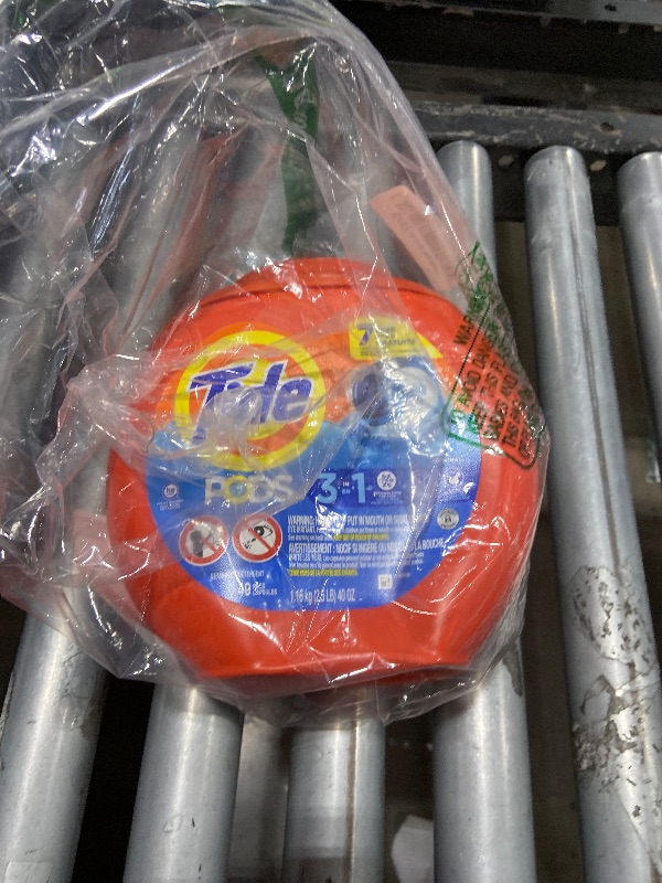 Photo 1 of Tide PODS Laundry Detergent Pacs, 3-in-1 Stain Remover, Odor Fighter, Color Protector, 42 Count, HE compatible, Original Scent (Packaging May Vary)