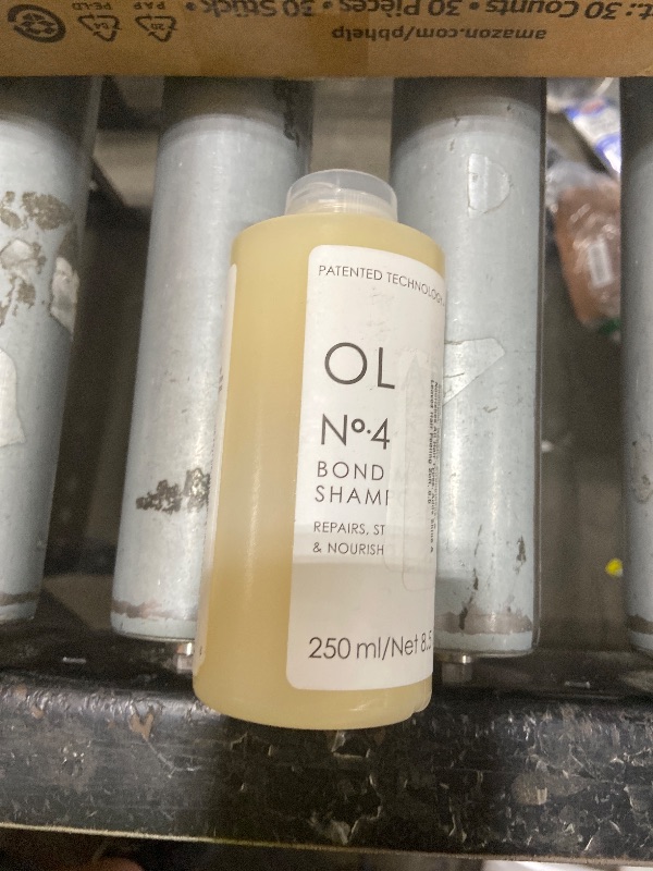 Photo 1 of Olaplex No. 4 Bond Maintenance Shampoo, Repairs, Strengthens, & Nourishes All Hair Types, Adds Shine & Leaves Hair Feeling Soft, 8.5 fl oz