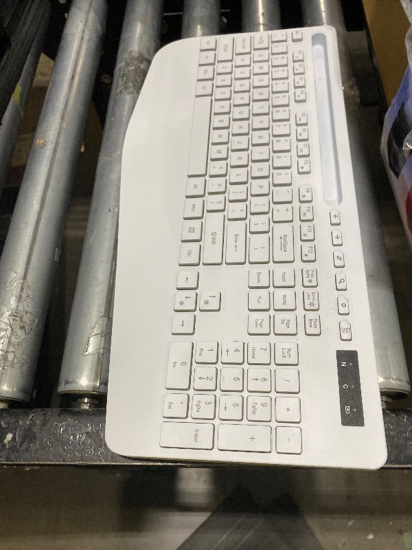 Photo 1 of Wireless Keyboard and Mouse Combo with 7 Colored Backlits, Wrist Rest, Rechargeable Ergonomic Keyboard with Phone Holder, Silent Lighted Full Size Combo for Windows, Mac, PC, Laptop-Trueque (White)