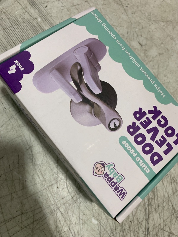 Photo 1 of Door Lever Locks (4 Pack) - Prevents Toddlers from Opening Doors - Durable ABS with 3M Adhesive - Easy One-Hand Operation for Adults, No Tools Needed