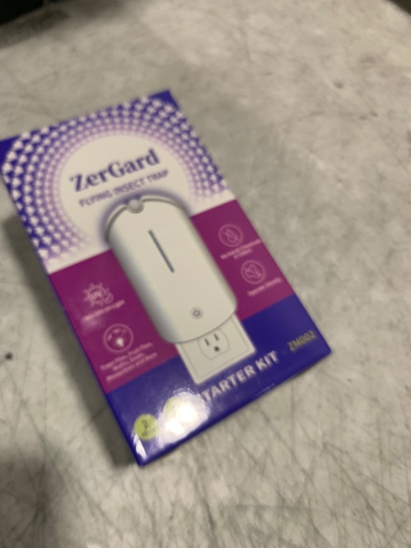 Photo 1 of Flying Insect Trap, ZerGard Indoor Plug in Bug Catcher with UV Light (2 Devices+10 Refills) Captures Mosquito Gnat Moth Fruit Flies for Kitchen, Living Room, Bedroom, ZM002