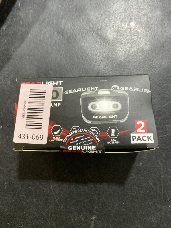 Photo 1 of GearLight 2Pack LED Headlamp - Outdoor Camping Head Lamps with Adjustable Headband - Lightweight Battery Powered Bright Flashlight Headlight with 7 Modes and Pivotable Head and Red Light