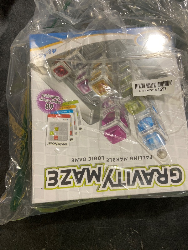 Photo 1 of ThinkFun Gravity Maze - Falling Marble Logic Game - Challenging STEM Toy for Kids 8-12 - Gravity Marble Maze - Brain-Building Fun - Educational Gift - Boosts Critical Thinking & Problem Solving