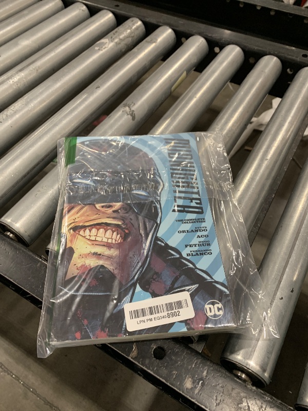 Photo 1 of Midnighter: The Complete Collection Paperback – June 14, 2022
