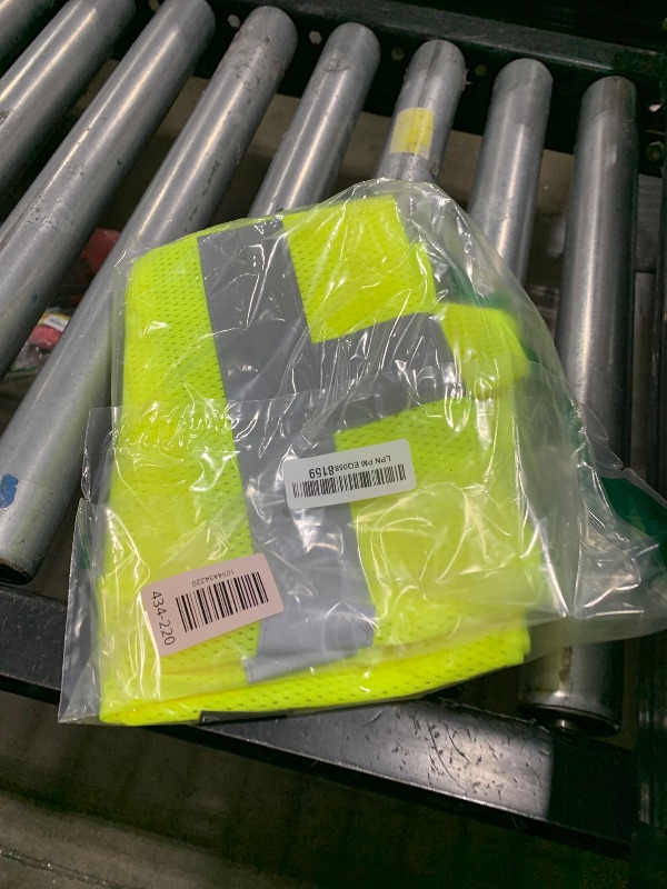 Photo 1 of safety vest with zipper pockets