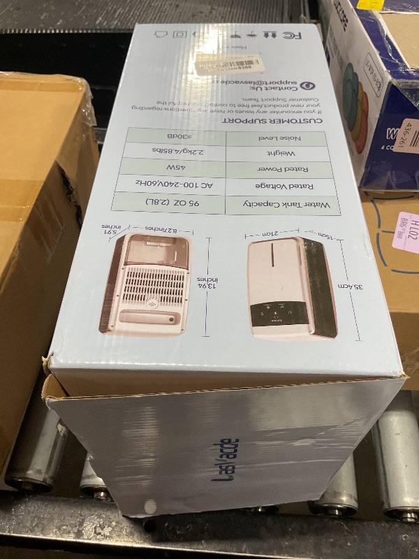 Photo 1 of LasVacde Dehumidifier for Bathroom with Drain Hose, 95 OZ Dehumidifiers for Home Bedroom Basement & RV?Auto Shut-off