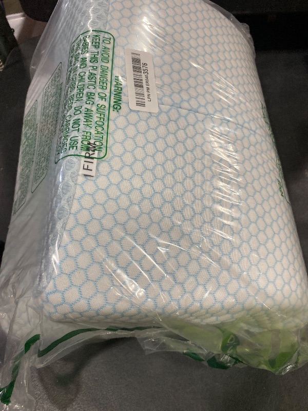Photo 1 of Anvo Memory Foam Pillow, Neck Contour Cervical Orthopedic Bed Pillow for Sleeping Side Back Stomach Sleeper, Ergonomic Design for Neck and Shoulder Pain Relief, Cyan, Firm
