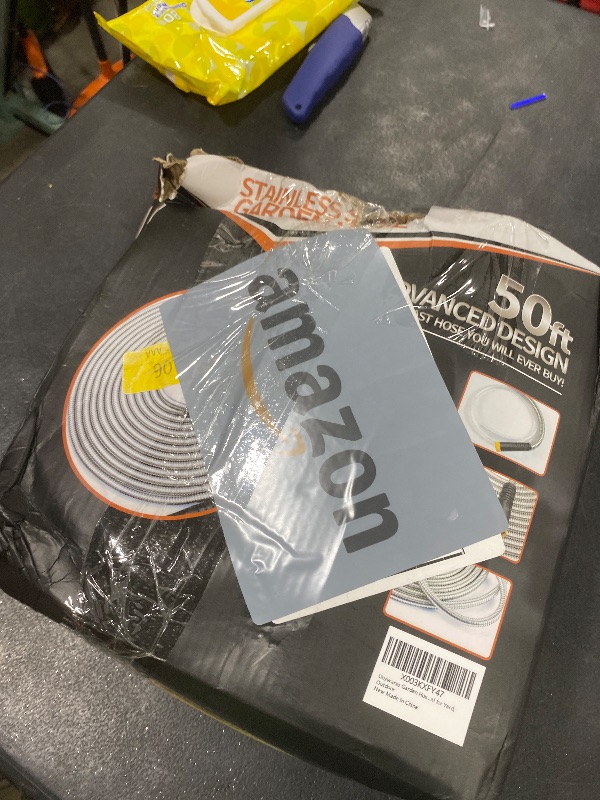 Photo 1 of Garden Hose 50 ft, Stainless Steel Water Hose with 10 Function Nozzle Flexible, Heavy Duty, Lightweight, No-Kink, Pet Proof, Puncture Proof Hose Metal for Yard, Outdoor