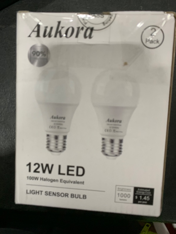 Photo 1 of Aukora Dusk to Dawn Light Bulb, 12W (100-Watt Equivalent) Smart Sensor Light Bulbs Super Bright E26 Automatic On/Off Security Lights Outdoor/Indoor for Porch Garage Garden Patio(Cool White 2 Pack)