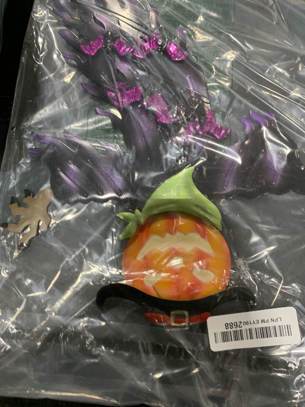 Photo 1 of ILLUMINEW Solar Halloween Metal Hanging Decorations Outdoor, Solar Powered Lighted Metal Pumpkin with Glowing Eyes for Halloween Outdoor Tree, Wall, Porch, Patio Decor (Pumpkin)