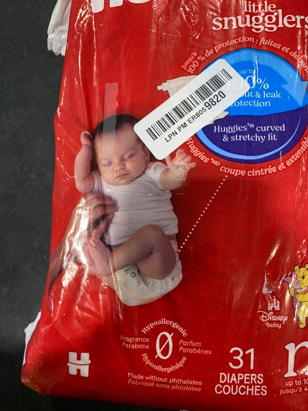Photo 1 of Huggies Size Newborn Diapers, Little Snugglers Baby Diapers, Size Newborn (up to 10 lbs), 31 Count, Packaging May Vary