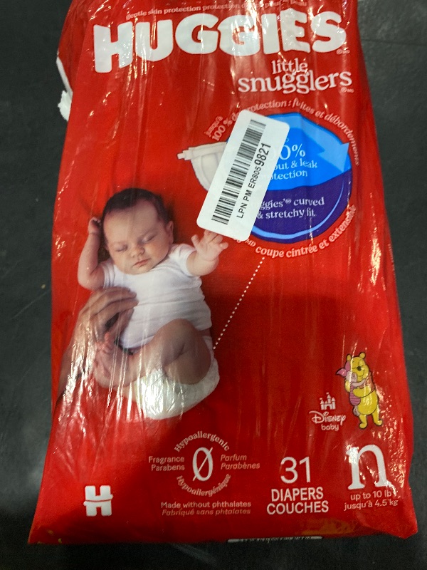 Photo 1 of Huggies Size Newborn Diapers, Little Snugglers Baby Diapers, Size Newborn (up to 10 lbs), 31 Count, Packaging May Vary