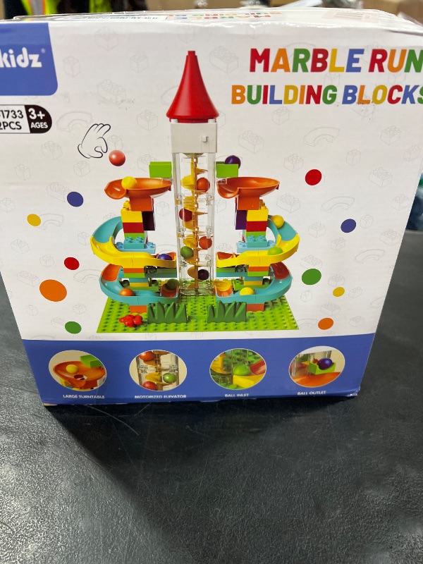 Photo 1 of Electric Marble Run with Automatic Elevator Lift - STEM Building Toy for Kids Ages 4-8, 102 PCS Construction Set with 10 Marbles & Transparent Track, Compatible with Standard Building Blocks