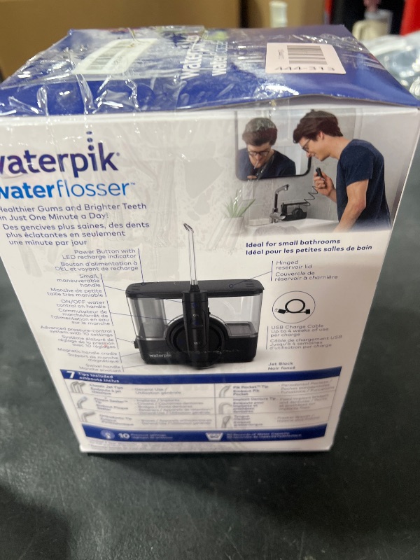 Photo 1 of Waterpik ION Professional Water Flosser, Rechargeable and Portable for Teeth, Gums, Braces, 10 Settings, 7 Flossing Tips For Multiple Users And Needs, ADA Accepted, WF-12 Black, Packaging May Vary
