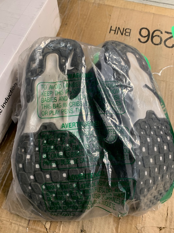 Photo 1 of ***(HEAVILY USED/ MINOR DAMAGE)***Nike Women's Renew Ride 3 Running Shoes, Black/White-Dk Smoke Grey, 8 M US