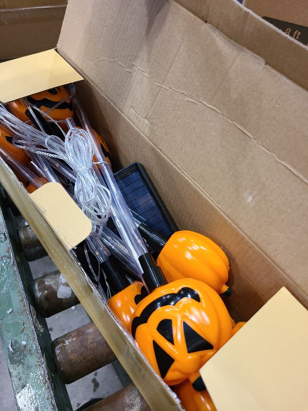 Photo 1 of 12 Pack Solar Pumpkin Lights for Halloween Decorations Outdoor, Waterproof Halloween Pathway Lights with 8 Modes, Orange Purple and Green Halloween Walkway Stake Lights for Yard Garden Party Decor