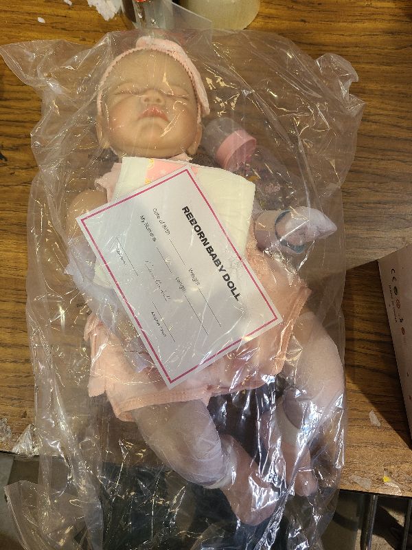Photo 1 of WOOROY Realistic Reborn Baby Dolls August - 20 Inch Lifelike Newborn Sleeping Girl Handmade Real Life Baby Dolls Reborn Toddler with Soft Weighted Cloth Body Gift Toy for Age 3+
