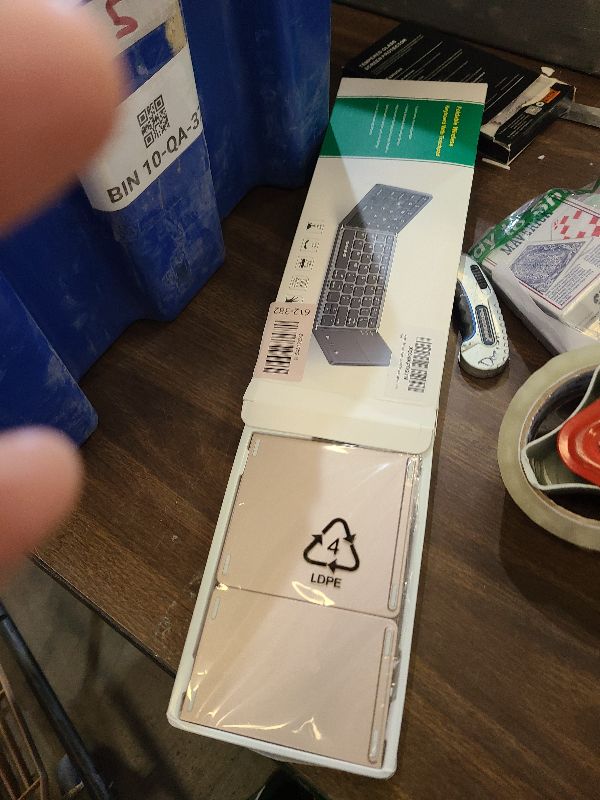 Photo 1 of Samsers Foldable Bluetooth Keyboard with Touchpad - Portable Wireless Keyboard with Holder, Rechargeable Full Size Ultra Slim Pocket Folding Keyboards for Android Windows iOS Tablet & Laptop - Pink