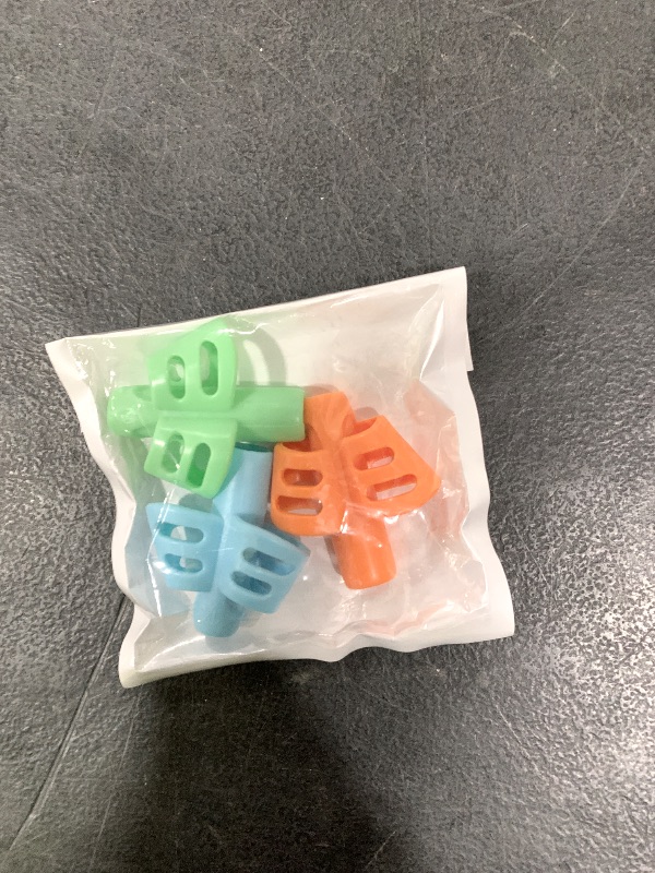 Photo 1 of JuneLsy Pencil Grips for Kids Handwriting Pencil gripper Pencil Holder Posture Correction Training Writing AIDS for preschooler Kids toddler Children Special Needs (3 PCS)