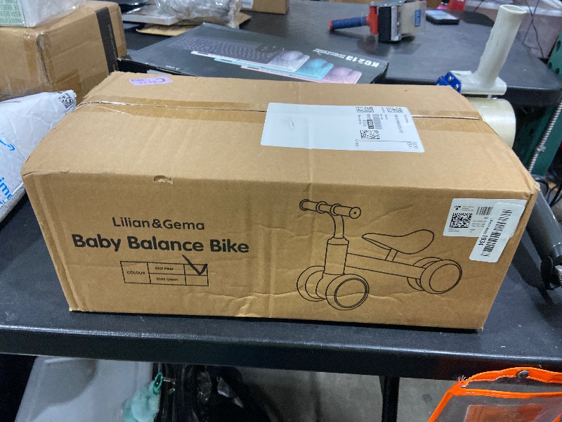 Photo 1 of Lilian&Gema Colorful Lighting Baby Balance Bike for 1 Year Old Boys Girls, 12-24 Months Toddler Balance Bike, No Pedal 4 Wheels Bike with Soft Seat, Toddler First Bike, 1st Birthday Gifts