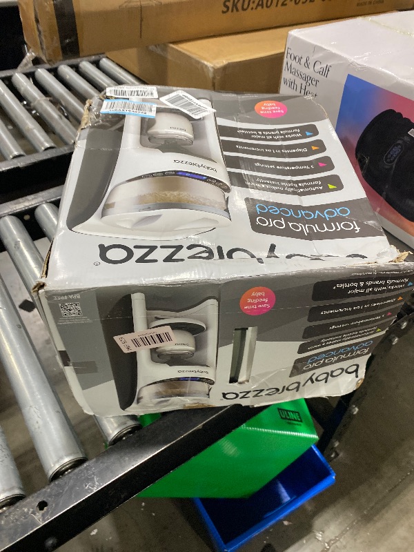 Photo 1 of Baby Brezza New and Improved Formula Pro Advanced Formula Dispenser Machine - Automatically Mix a Warm Formula Bottle Instantly - Easily Make Bottle with Automatic Powder Blending, White