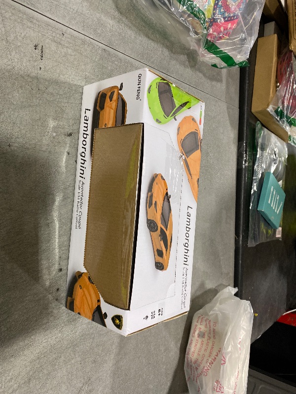 Photo 1 of QUN FENG RC Car 1:18 Compatible with Lamborghini Aventador 2.4G Radio Remote Control Cars Electric Car Sport Racing Hobby Toy Car Grade Licensed Model Vehicle for Halloween (Orange)