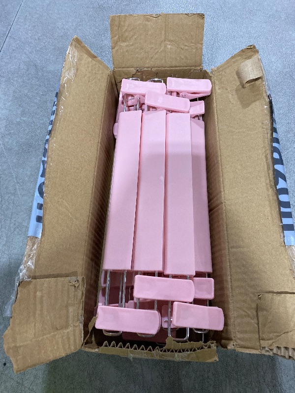 Photo 1 of Set of Plastic Hangers
