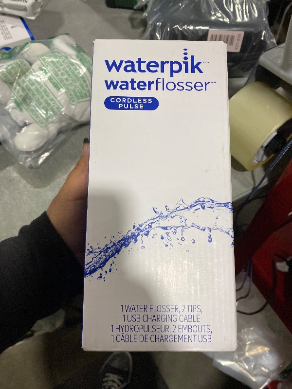Photo 1 of Waterpik Cordless Pulse Rechargeable Portable Water Flosser for Teeth, Gums, Braces Care and Travel with 2 Flossing Tips, Waterproof, ADA Accepted, WF-20 White, Packaging May Vary