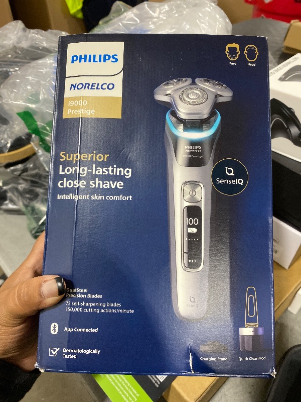 Photo 1 of Philips Norelco Shaver i9000 Prestige, Wet & Dry Electric Shaver, Dark Slate Nova, SenseIQ Technology, Triple Lift & Cut System, 360 Rotating Dual SteelPrecision Blades, Charging Stand, XP9204/85