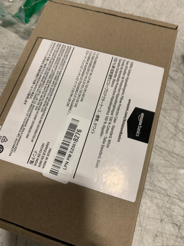 Photo 1 of Amazon Basics Standard Pillowcase with Zipper, 100% Cotton Hypoallergenic, Pillow Protector, White (27 x 21 Inches), Pillows Not Included