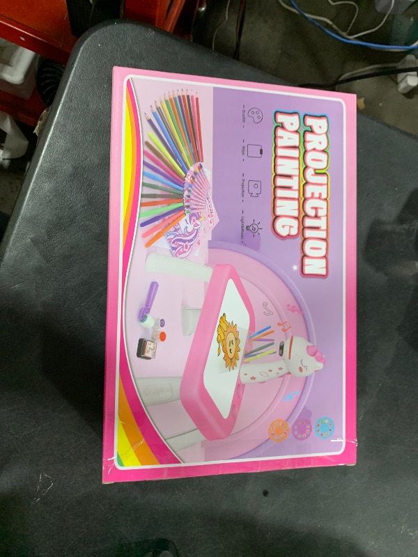 Photo 1 of Drawing Projector for Kids, Art and Crafts, Drawing Board with Music, Color Pens, Pencils, Crayons, Scrapbook, Unicorn Sticker Book, Ideal Toy for 3+ Year Old Girls & Boys (Unicorn Kit)