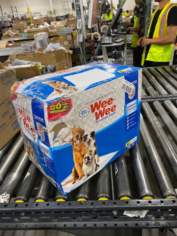 Photo 1 of Four Paws Wee-Wee Superior Performance Pee Pads for Dogs with Runoff Barrier Edge Guard Protection, Puppy & Dog Potty Training Pads, Housebreaking Supplies, 28" x 34" (75 Count)