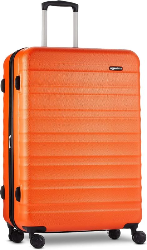 Photo 1 of Amazon Basics 30" Hardside Large Checked Luggage, Hardshell Suitcase With Wheels, Expandable For Up to 15% More Space, With Scratch-Resistant Surface, Four Multi-directional Wheels, Orange