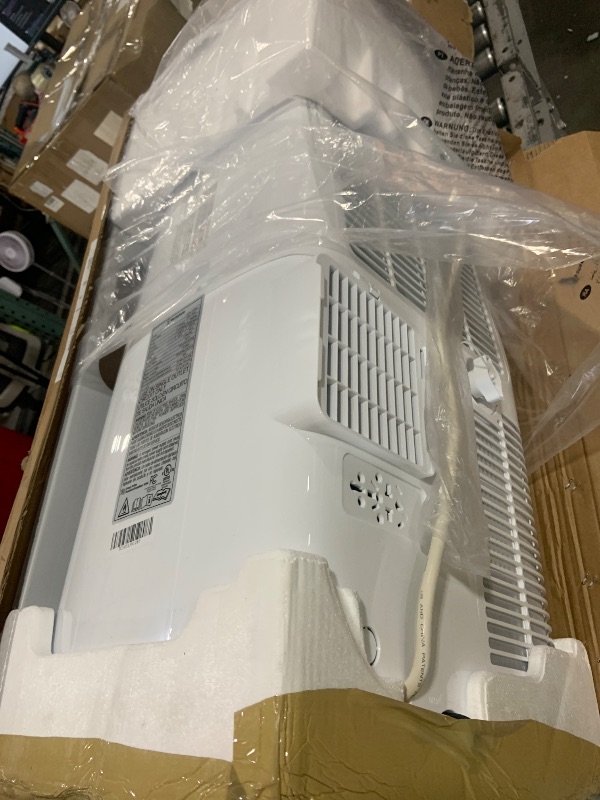 Photo 1 of Westinghouse 14,000 BTU Air Conditioner with Heat Mode, WiFi Enabled, Remote Controlled, Dehumidifier, 3-Speed Fan, Programmable Timer, Window Kit