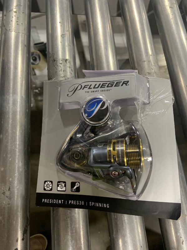 Photo 1 of Pflueger President Spinning Fishing Reel, Size 30, 10 Stainless Steel Ball Bearing System, Sealed Oil Felt Front Drag, Lightweight Graphite Construction